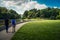 Two Asian men are walking in a park, Cincinnati, Ohio