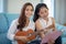 Two asian women are having fun playing ukulele and smiling at home for relax time