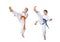 Two athletes in karategi beat kick