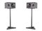 Two audio studio stands for monitors and a professional speaker. Pa system speaker