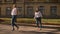 Two Awesome Caucasian Girls Are Dancing Together On The Street In Sunny Light Day, Being Inspired And Happy, Showing