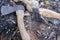 Two axes in stump tree. Danger concept. Rusty tool background. Wooden axe closeup.