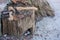 Two axes in weathered stump tree. Danger concept. Rusty tool background. Wooden axe.