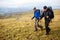 Two backpackers in mountains