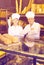 Two bakers at the counter at bakery