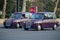 Two Baku taxis `London Taxi TX4` of purple color awaiting passengers, Baku