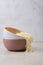 Two bamboo plates bowls with egg noodles on a light background