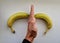 two bananas are approaching each other with their tips. he separates