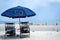 Two beach chairs and umbrella at Tybee beach near Savannah, Georgia.