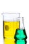 Two Beakers with Green and Yellow Liquids