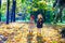 Two beautiful adorable girls walking in the fall