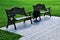 Two beautiful benches in the city square. Cast iron bench backs.