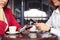 Two beautiful busy females working on smartphones