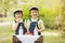 Two beautiful children, boy brothers, eating strawberries and co