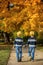 Two beautiful children, boy brothers, walking on a path in beaut