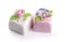 Two beautiful decorated marzipan cakes on white