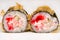 Two beautiful sushi roll with crab closeup