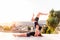 Two beautiful women doing acroyoga in the city