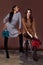 Two beauty women pretty face wear brown and blue knitted suit body shape makeup cosmetic accessory bag collection shoes