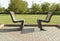 Two benches facing each other in the garden