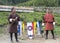 Two Bhutanese Archers with traditional bamboo bows and target , Bhutan