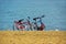 Two bicycles on beach