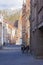 Two bicycles leaning against brick buildings Bruges