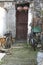 Two bicycles parked outside a slum