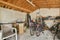 two bikes in the garage of a home with wood