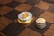 Two Bitcoins and American cents on a chessboard