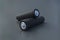 Two black blank batteries aa or aaa size on gray background
