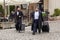 Two black-clad Hasidic pilgrims