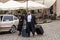 Two black-clad Hasidic pilgrims who have just stepped out of a taxi