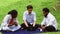 Two Black Man Listening to Their Team Leader Briefing While Sitting in the Nature