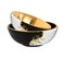 two black and white bowls with gold trims on them one with a gold rim and the other with a black and white design,