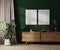 Two blank poster frames mock up on green wall with sunlight, modern room interior with wooden furniture