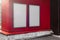 Two blank white outdoor banners at modern building red wall, 3d rendering.