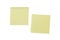 Two blank yellow Post-it notes