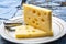 Two blocks of French emmental semi-hard cheese