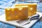 Two blocks of French emmental semi-hard cheese