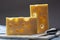 Two blocks of French emmental semi-hard cheese