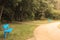 Two blue benches in park nature sepia background