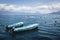 Two blue boats on lake Atitlan with view on volcanic mountians in Santa Cruz la Laguna, Guatemala