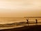 Two blurred girls doing ballet on a beach during sunset in Cartagena Colombia