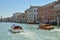 Two boats riding through Grand Canal in Venice, Italy