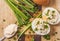 Two boiled eggs with mayonnaise on cutting board