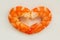 Two boiled peeled king prawns in the shape of a heart. I like seafood consept. Delicacy, tasty and healthy sea food, close up, top