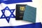 Two booklet covers of Israeli identity card on Flag of Israel.Passport of a citizen. Passport Israel on flag Israel