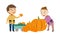 Two boys in autumn clothes collect and transport pumpkin crops