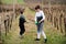 Two boys brothers working on vineyard